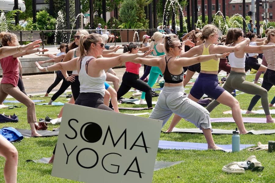 Yoga students practicing at a studio in Boston's South End