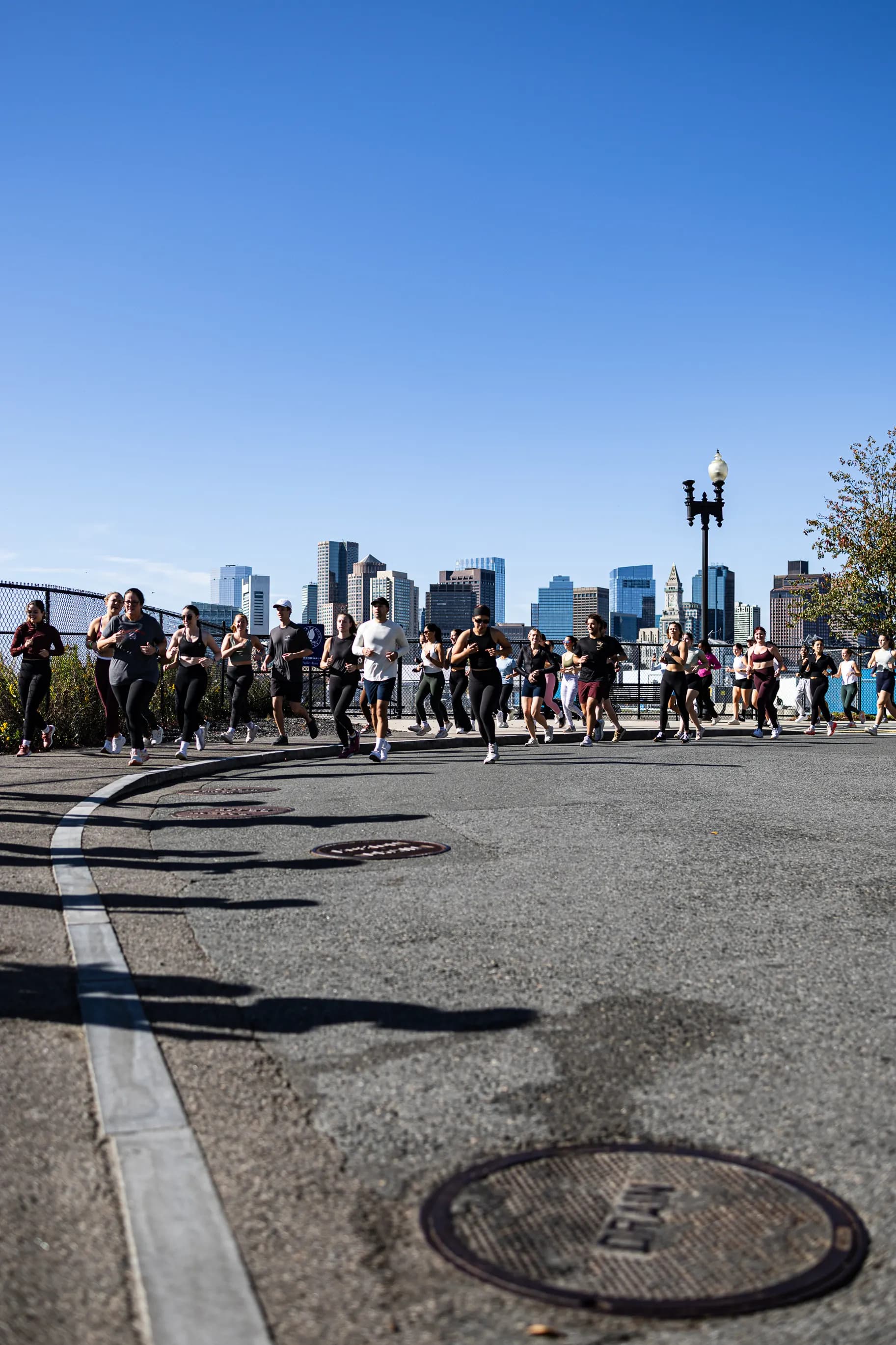 Boston run club running by the skyline