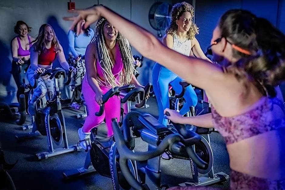 Indoor cycling in a safe, LGBTQ+ affirming gym environment