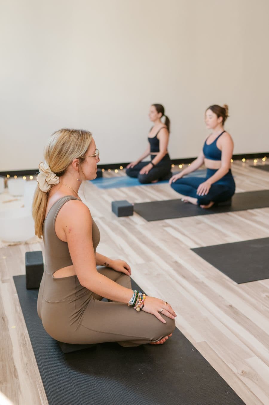 A yoga class at Summer Street Wellness in South Boston — featured in Fit Scene Boston's fall reset wellness guide for September 2026.